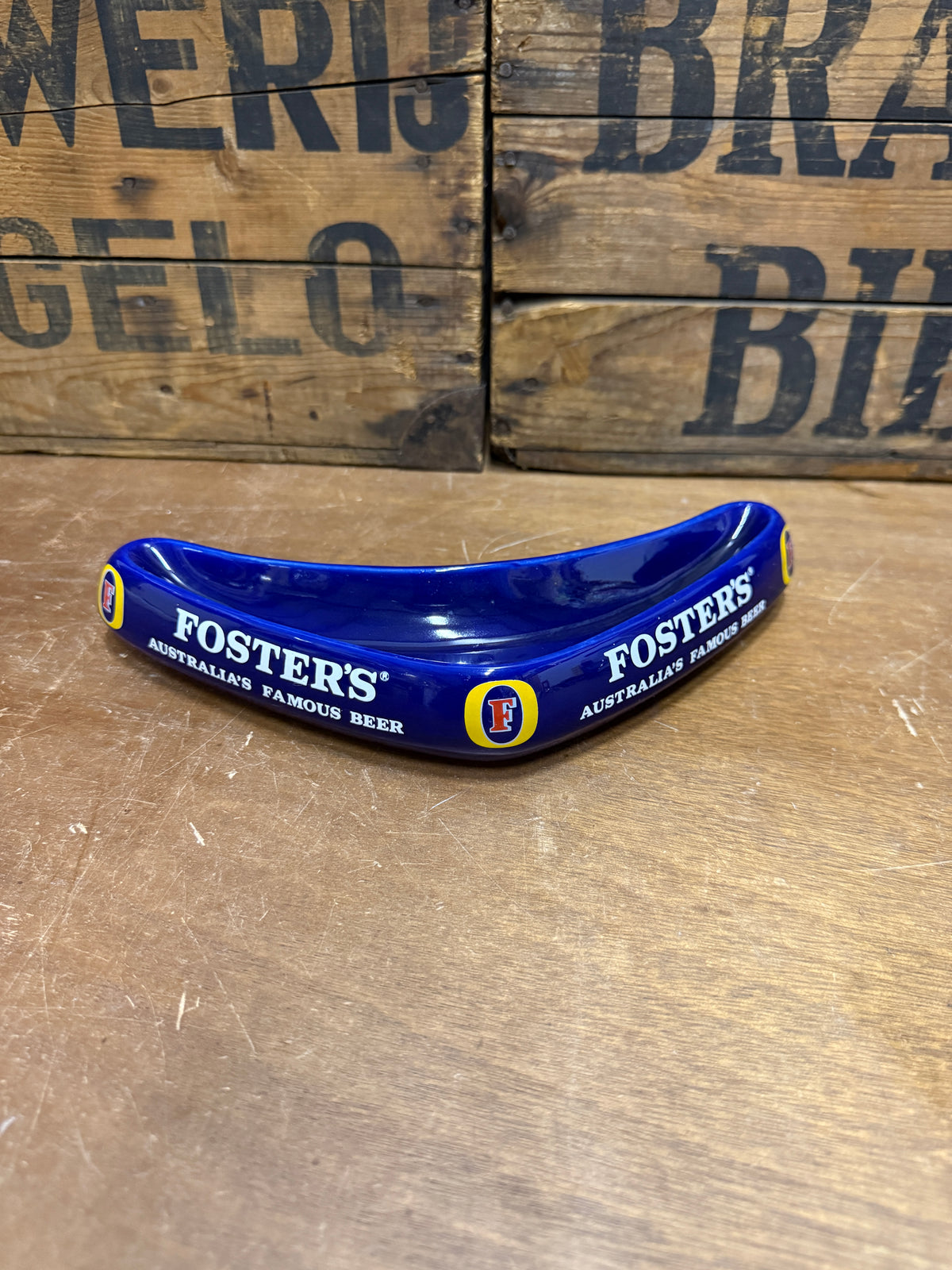 Vintage Fosters reclameasbak