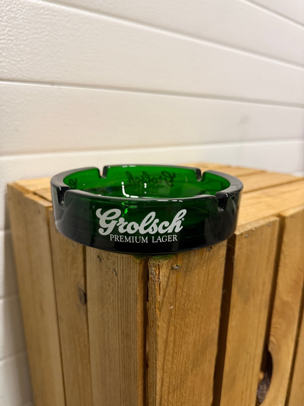 Grolsch Premium Lager reclameasbak van groen glas