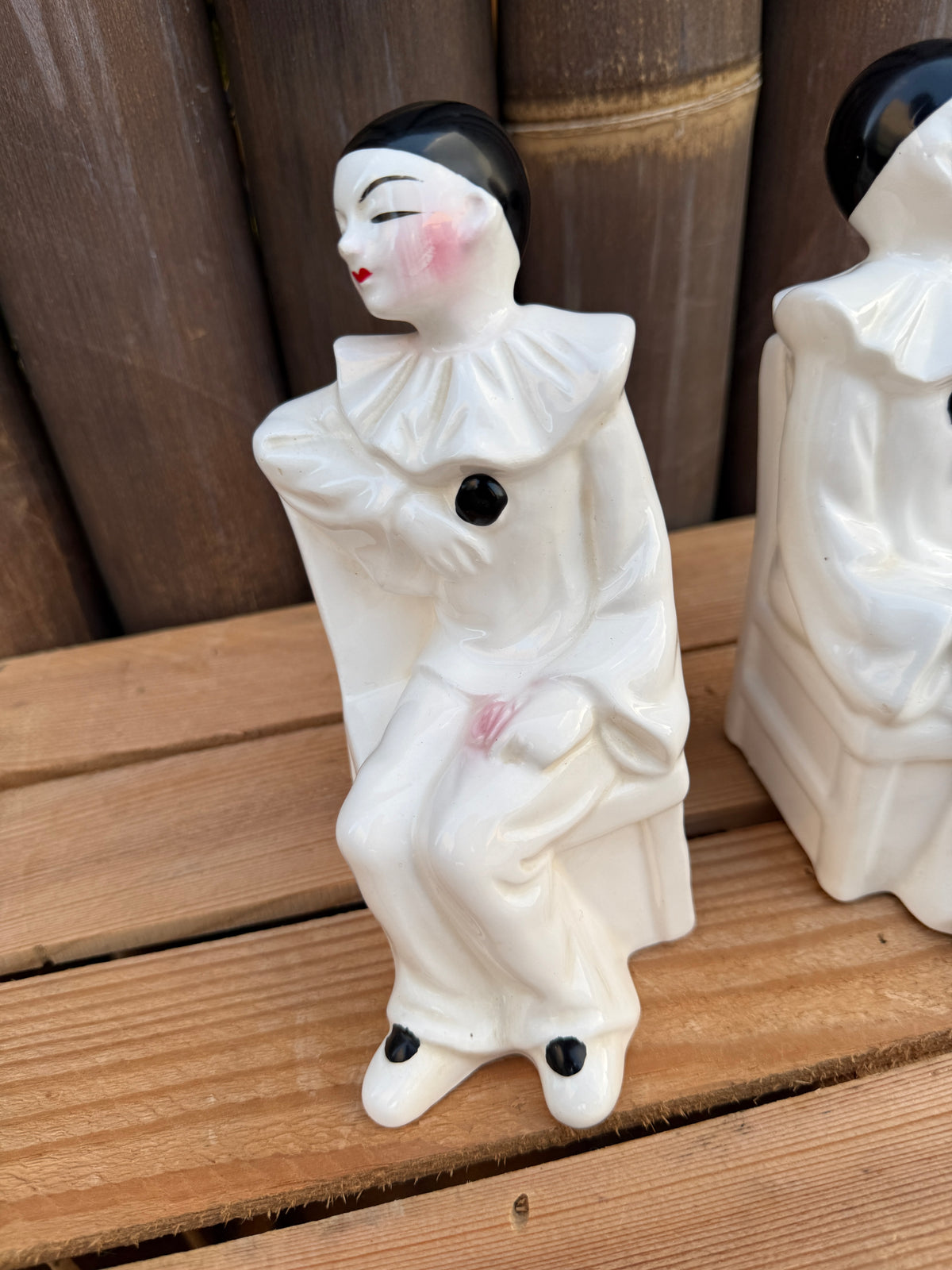 Set 2 vintage Pierrot clown boekensteunen keramiek