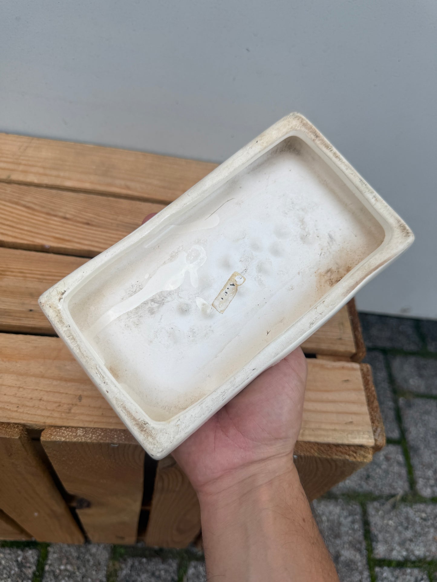 asbak met honderd dollar biljet