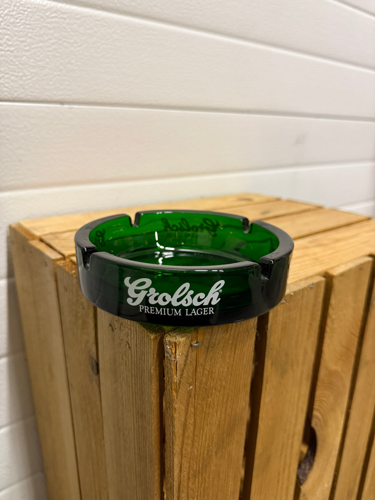 Grolsch Premium Lager reclameasbak van groen glas