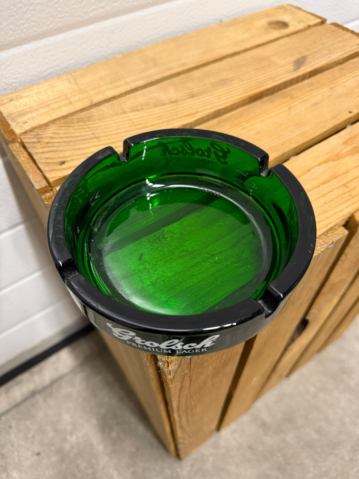Grolsch Premium Lager reclameasbak van groen glas
