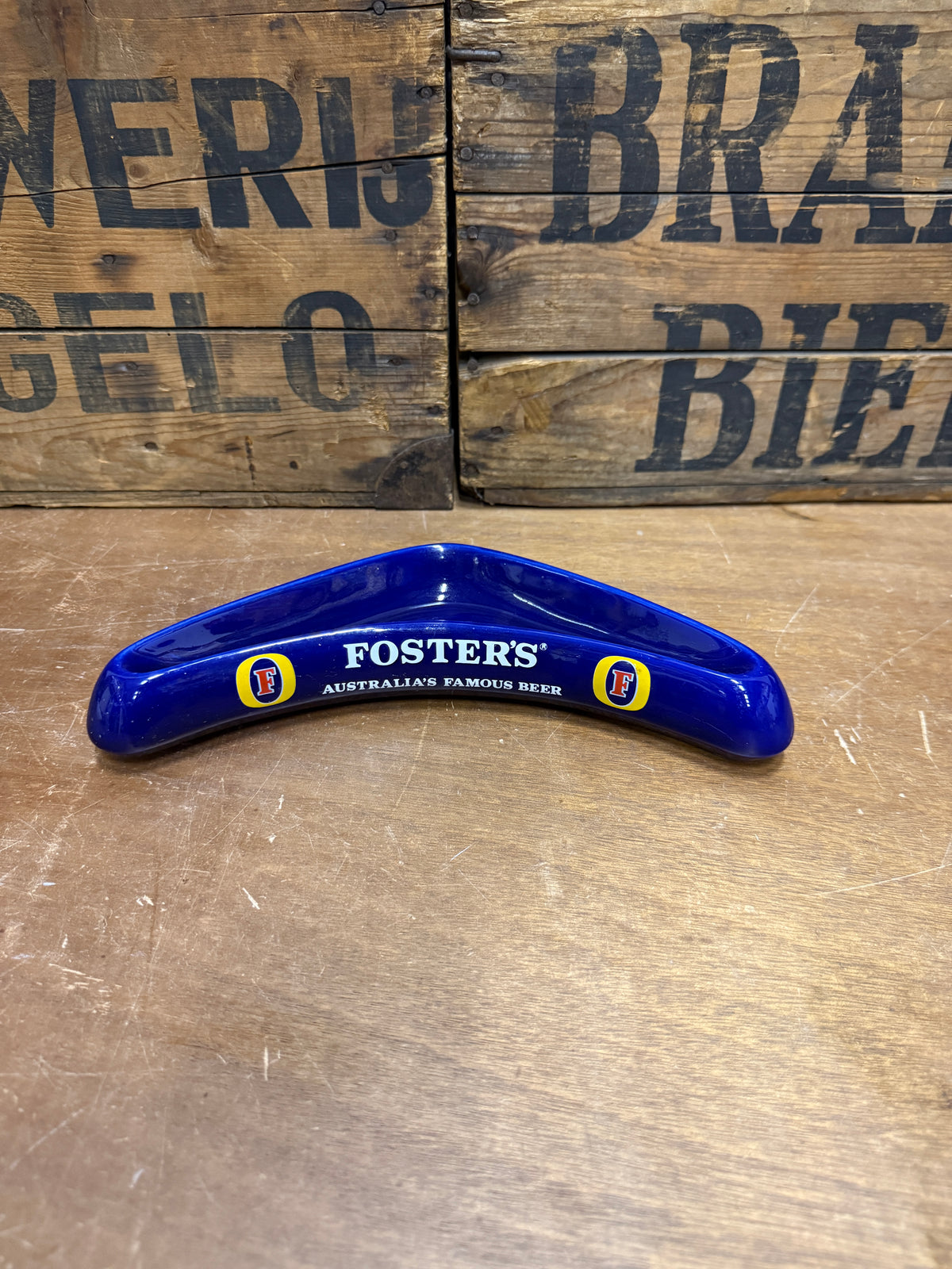 Vintage Fosters reclameasbak