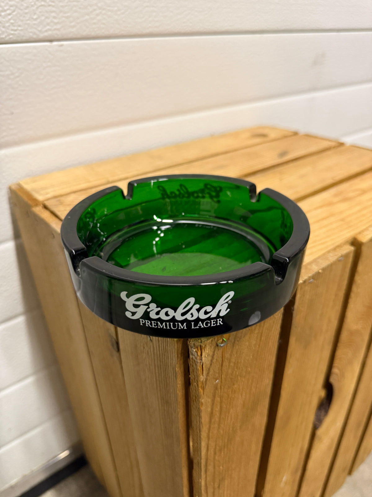 Grolsch Premium Lager reclameasbak van groen glas
