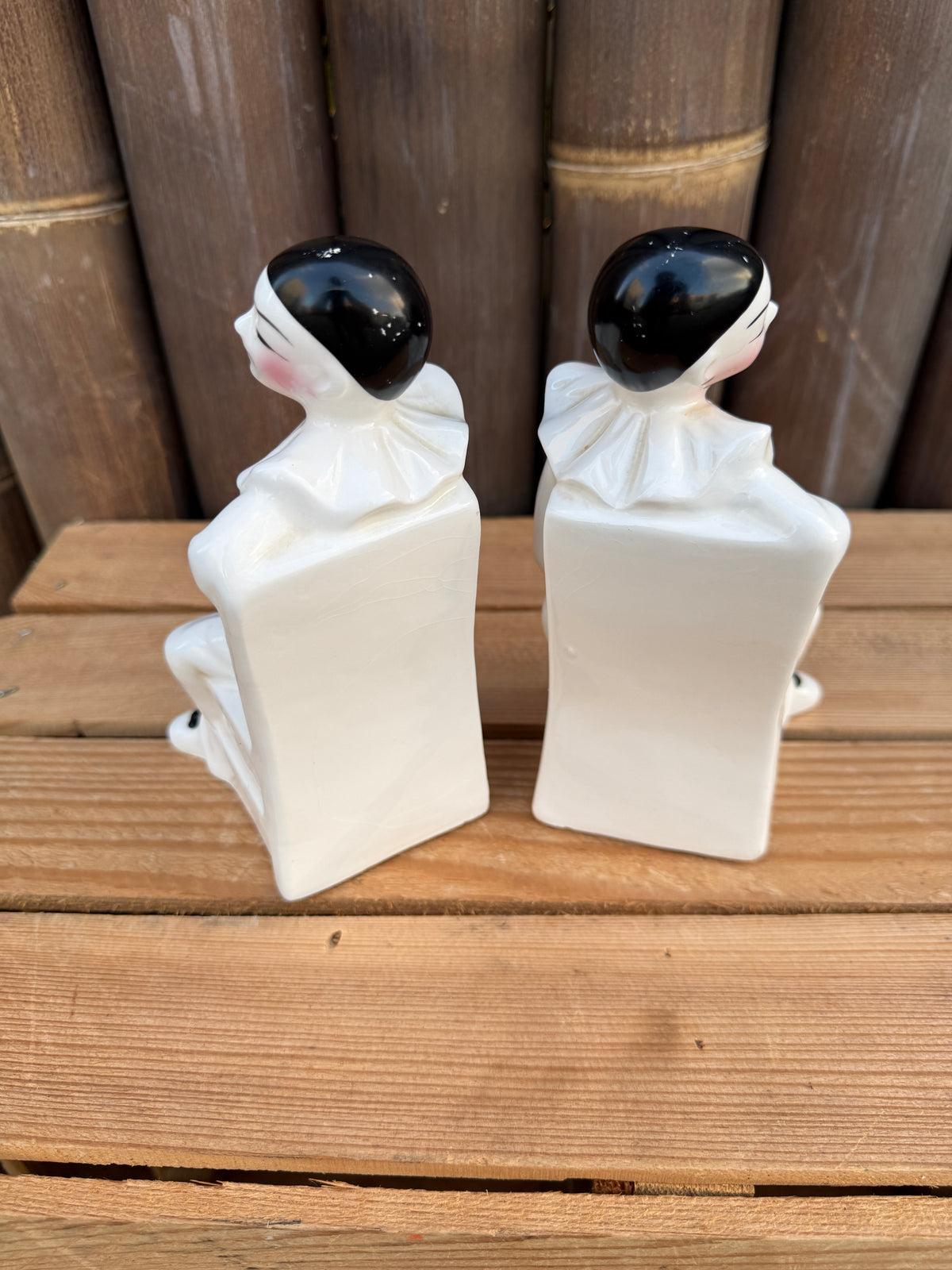 Set 2 vintage Pierrot clown boekensteunen keramiek