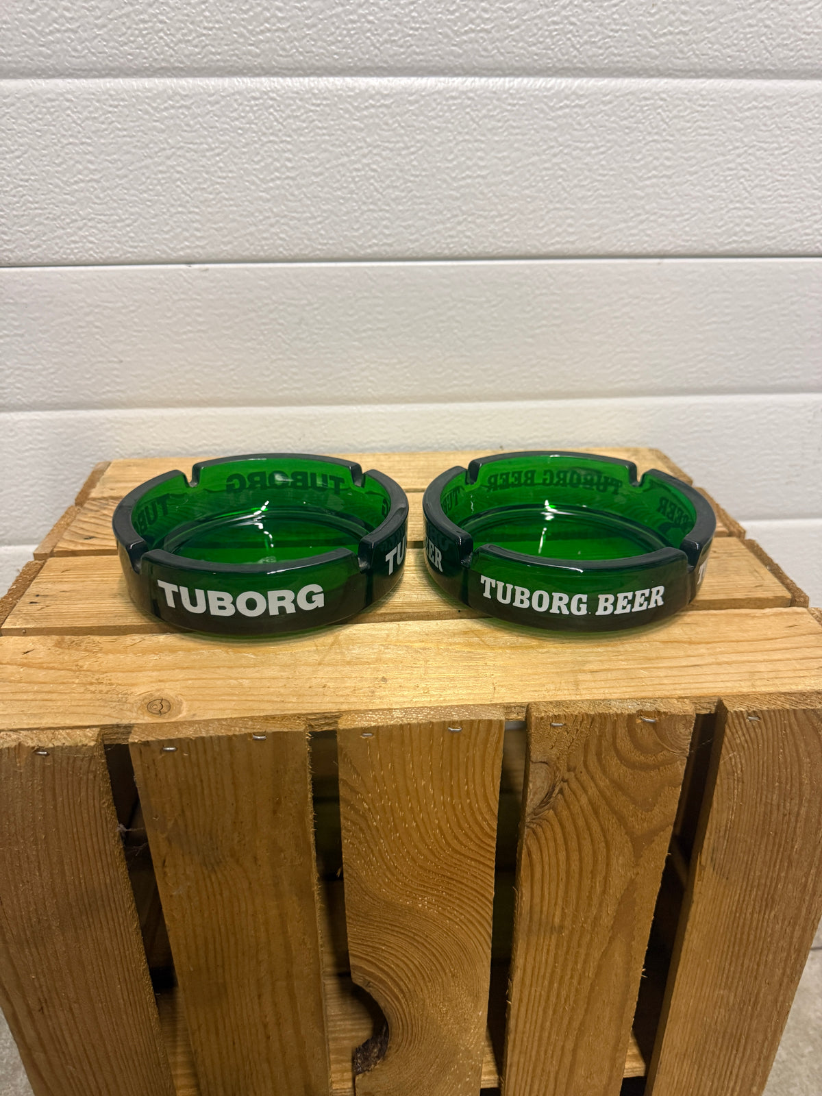 Tuborg reclameasbak van zwaar groen glas