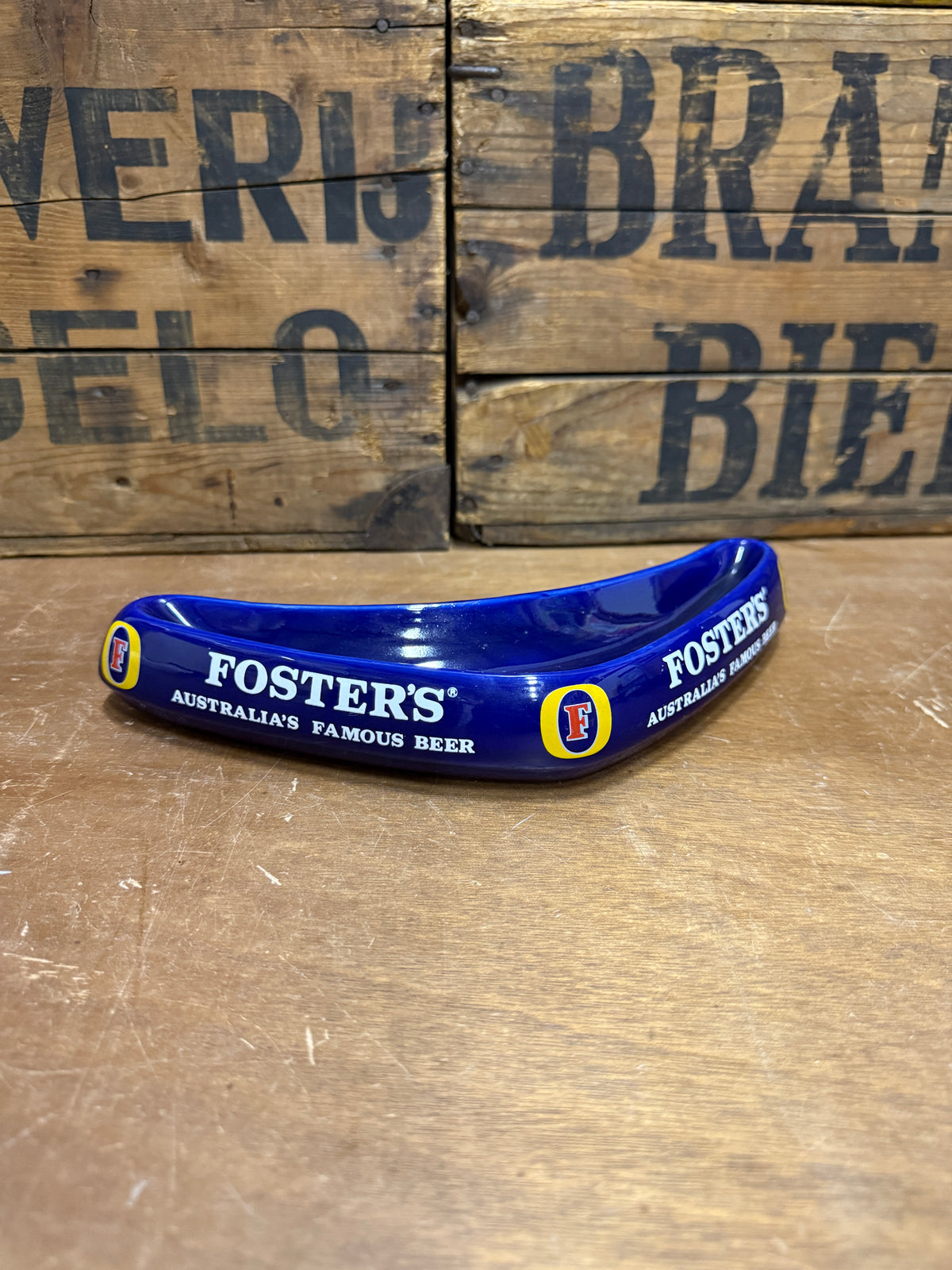 Vintage Fosters reclameasbak