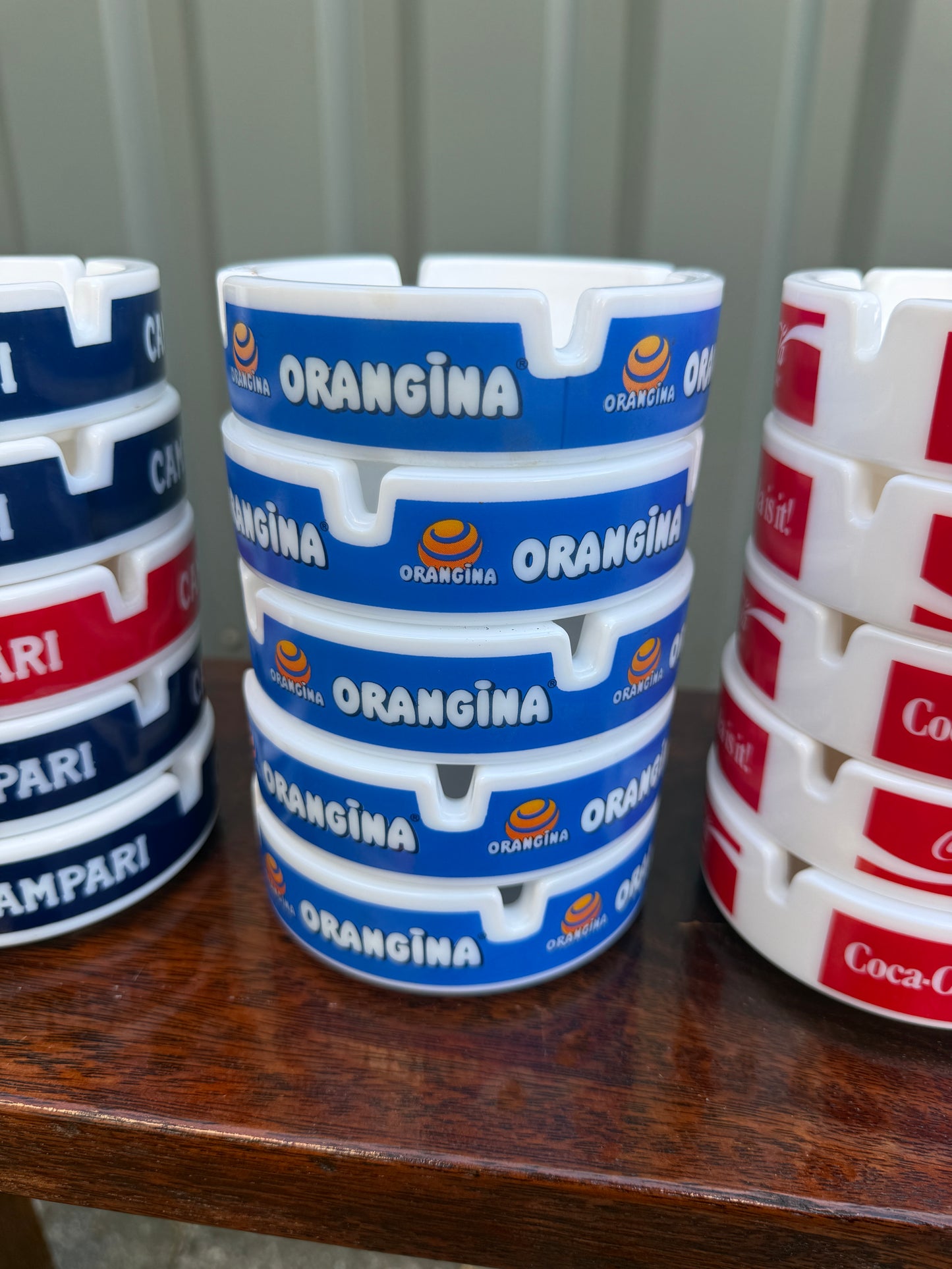 Reclame asbakken frisdrank en aperitief