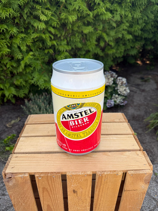 Amstel Bier can CD holder, vintage novelty storage, Dutch beer collectible, red and yellow design, 90s bar decor, Holland souvenir
